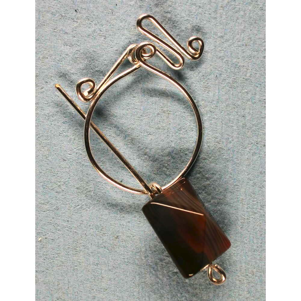 Penannular Brooch Rolled Silver Botswana Agate 001Image with link to high resolution version