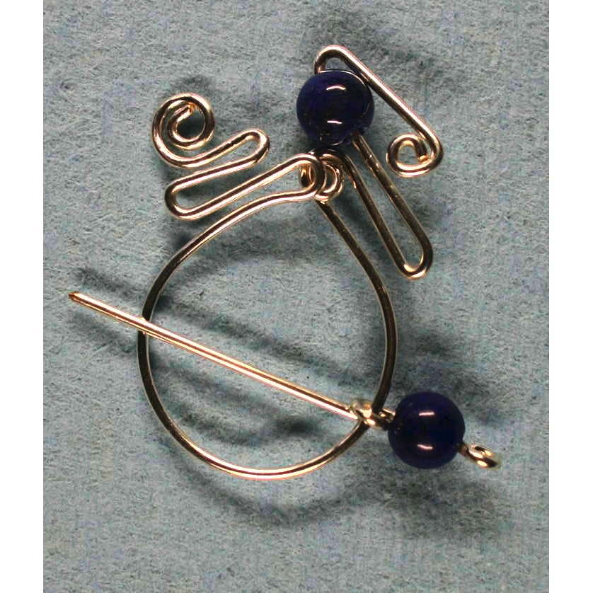 Penannular Brooch Rolled Silver Lapis Lazuli 001Image with link to high resolution version